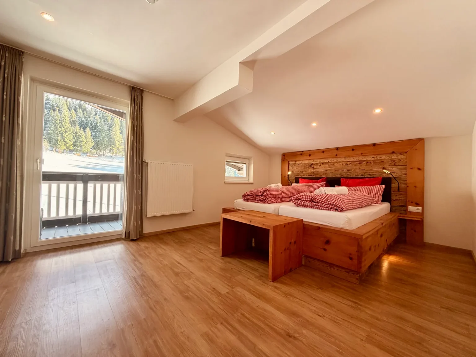 Bedroom in Room 12 at Hotel Alpenhof