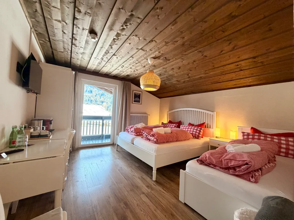 Bedroom in Room 8 at Hotel Alpenhof