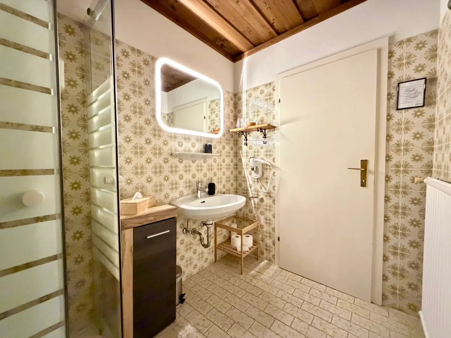 Bathroom in Room 10 at Hotel Alpenhof